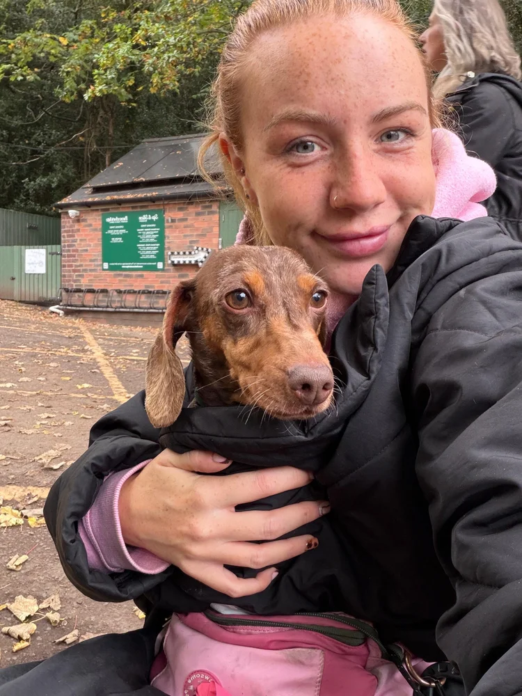 Amy with a dachshund
